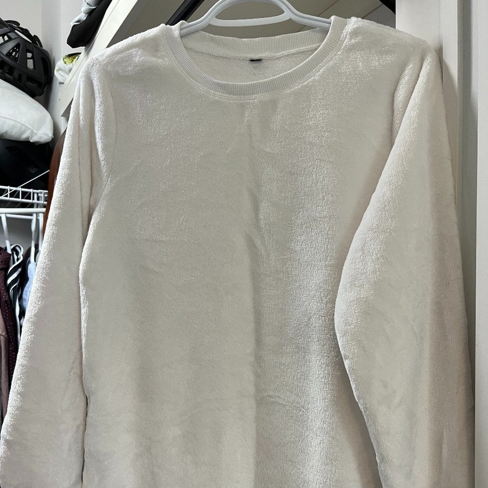 Soft and fuzzy white sweater